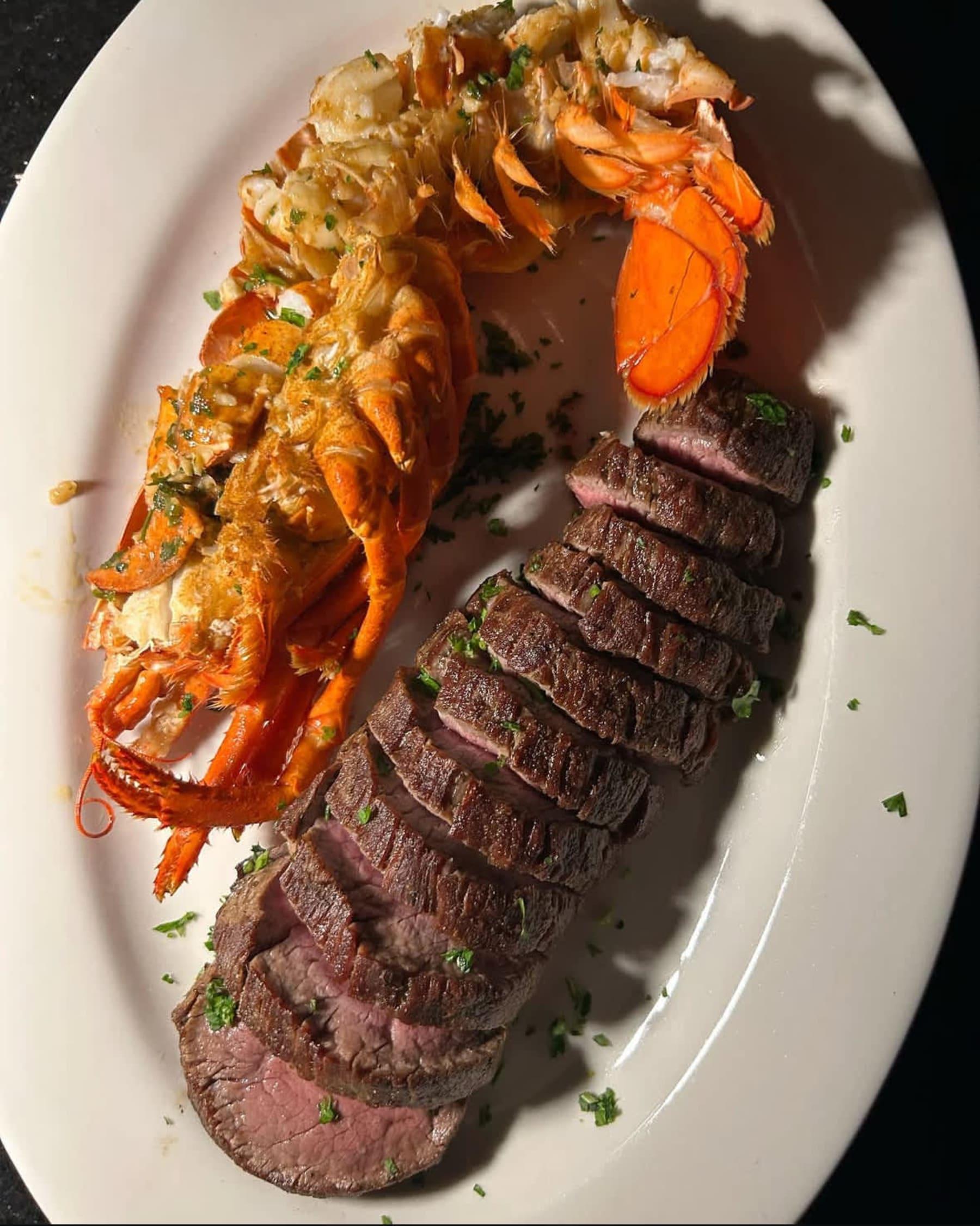 Surf & Turf perfection. Tender filet mignon meets buttery lobster tail—crafted to impress and plated to perfection. A true indulgence. 🥩🦞✨